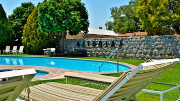 Outdoor pool, pool umbrellas, pool loungers