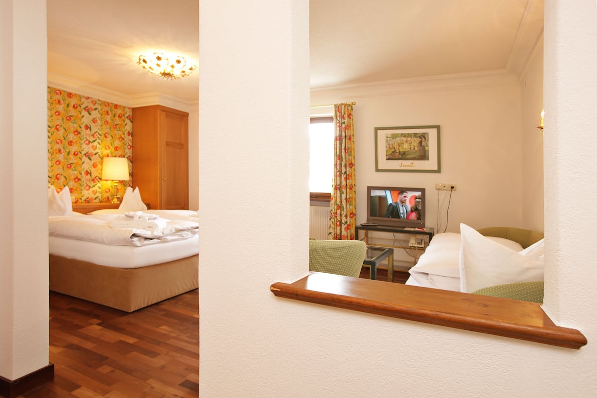 Habitación doble | Ropa de cama de alta calidad y edredones de plumas