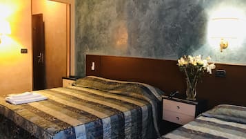 Triple Room | Desk, laptop workspace, blackout drapes, free WiFi