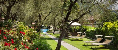 Indoor pool, seasonal outdoor pool, pool umbrellas, pool loungers