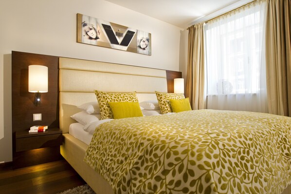 Premium bedding, down duvets, minibar, in-room safe