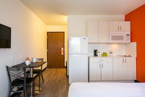 Full-sized fridge, microwave, stovetop, coffee/tea maker
