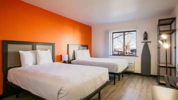 Desk, blackout curtains, iron/ironing board, rollaway beds