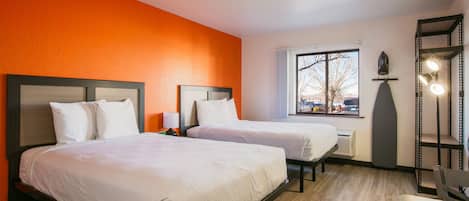Desk, blackout drapes, iron/ironing board, rollaway beds