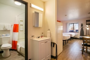 Desk, blackout drapes, iron/ironing board, rollaway beds