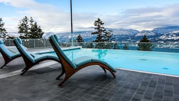 Indoor pool, outdoor pool, open 7 AM to 10 PM, pool umbrellas