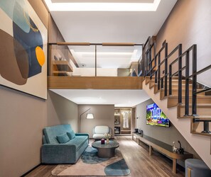Superior Suite, 1 King Bed (Duplex) | Down comforters, desk, laptop workspace, blackout drapes