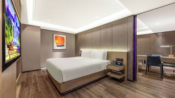 Deluxe Suite, 1 King Bed | Down duvets, desk, blackout curtains, soundproofing