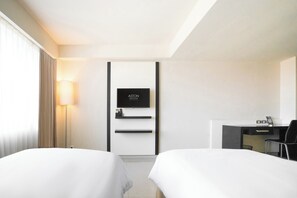 Ropa de cama de alta calidad, camas con pillow-top y minibar 