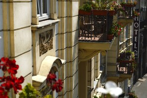 Experience the classic charm of this traditional hotel, featuring elegant balconies with seating areas and beautiful views.