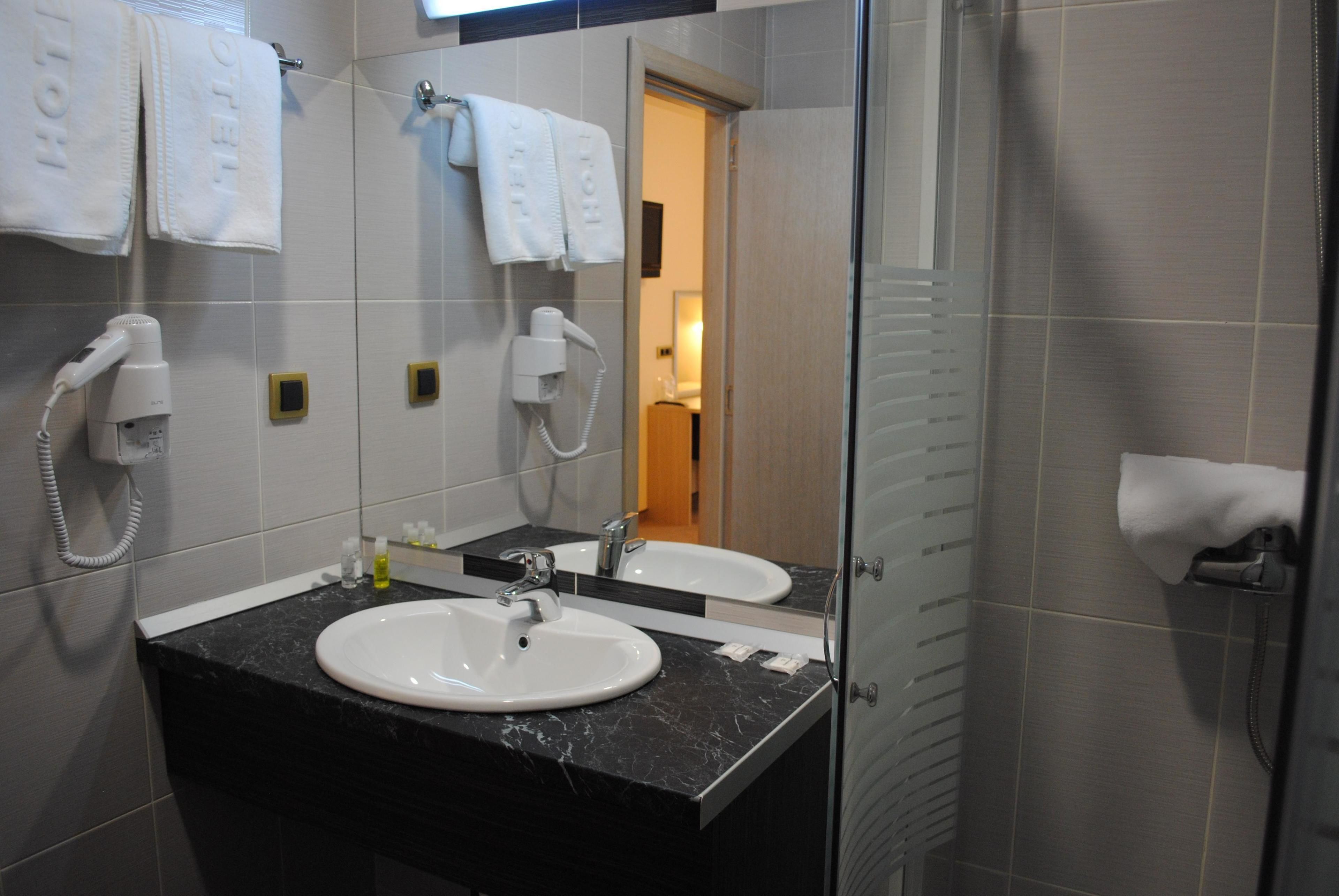 shower, free toiletries, hair dryer, slippers