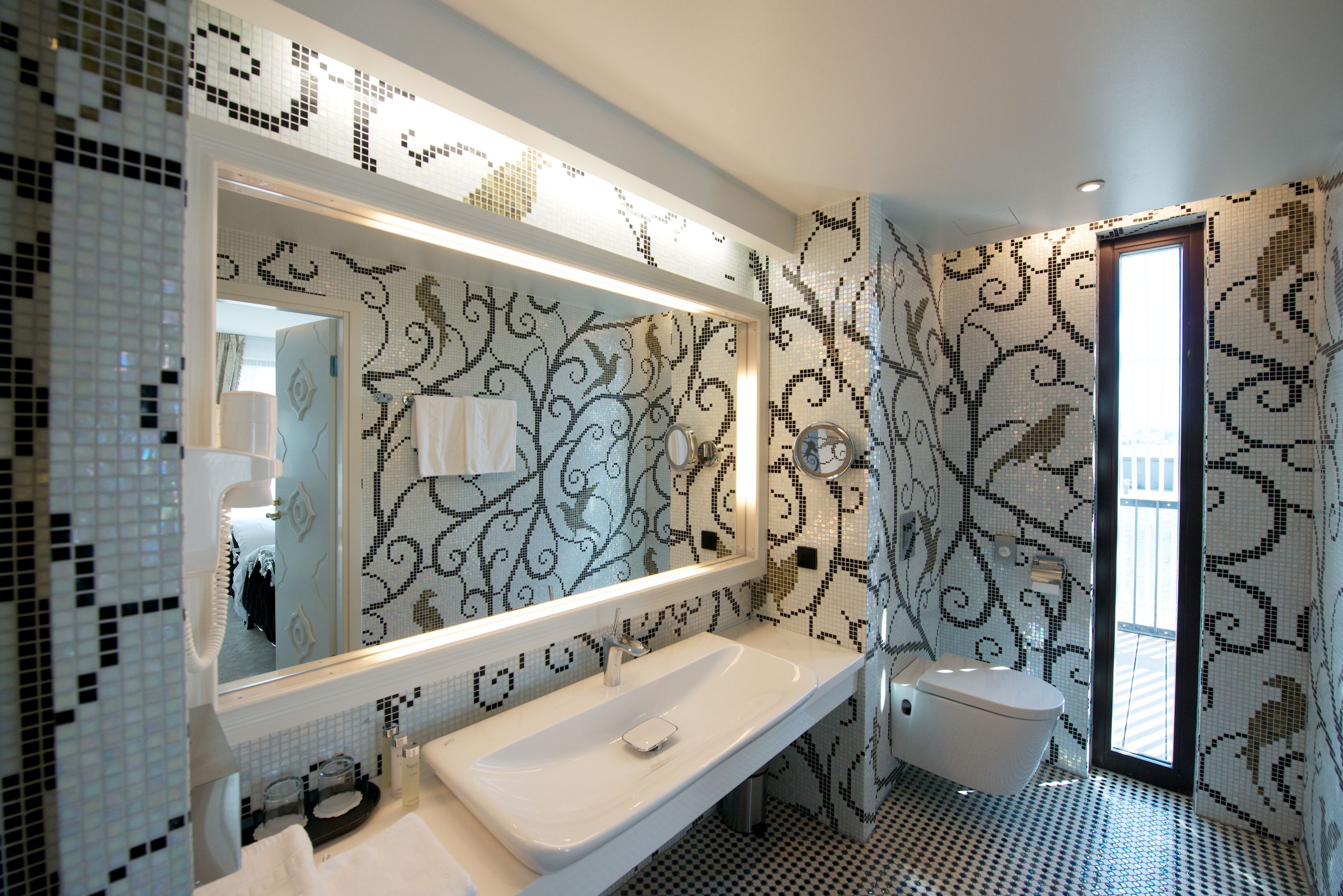 shower, free toiletries, bathrobes, slippers