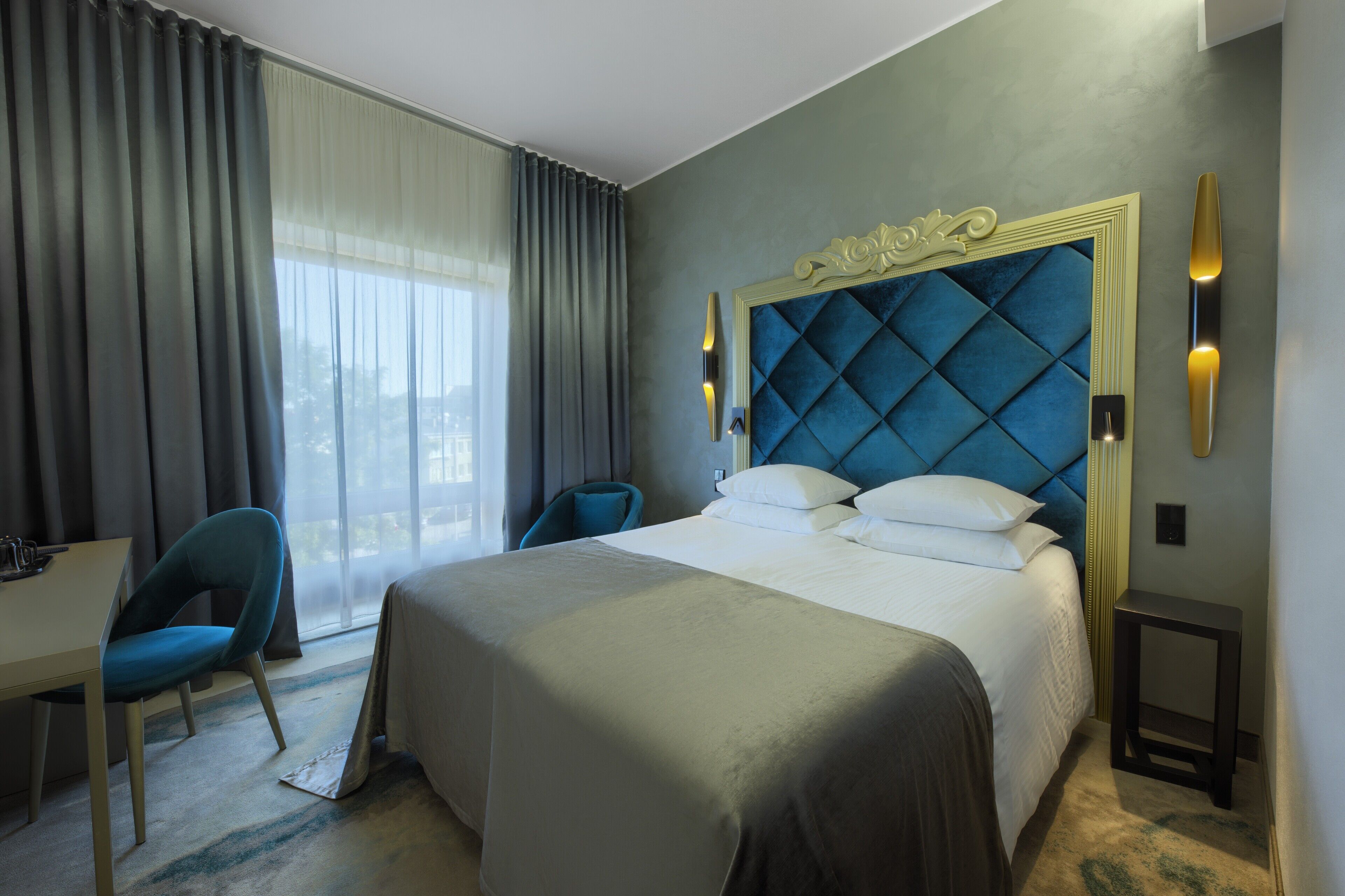 Dobbelt- eller tomannsrom – standard (with Spa Access) | Sengetøy av topp kvalitet, minibar, safe på rommet og skrivebord