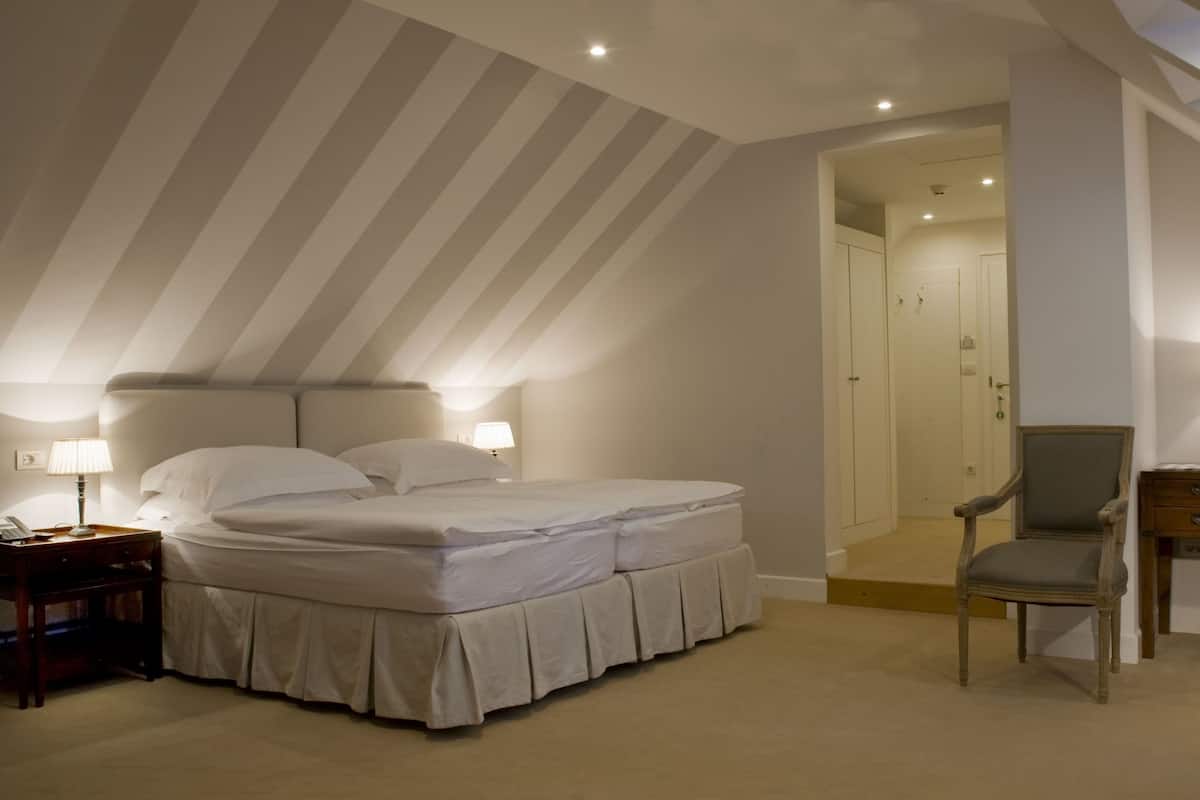 Tempur Pedic-bedden, een minibar, een kluis op de kamer