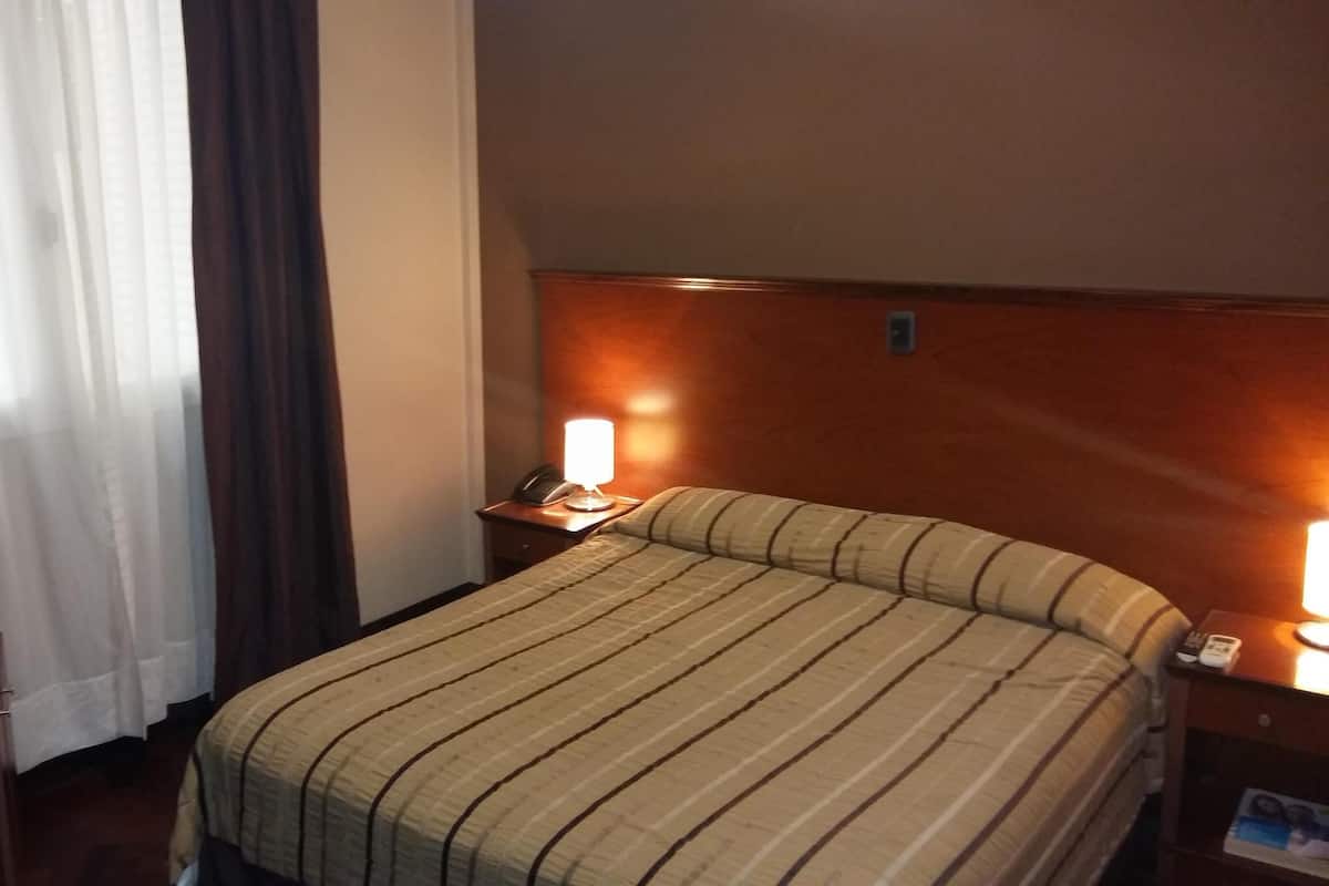 Minibar, desk, blackout drapes, soundproofing