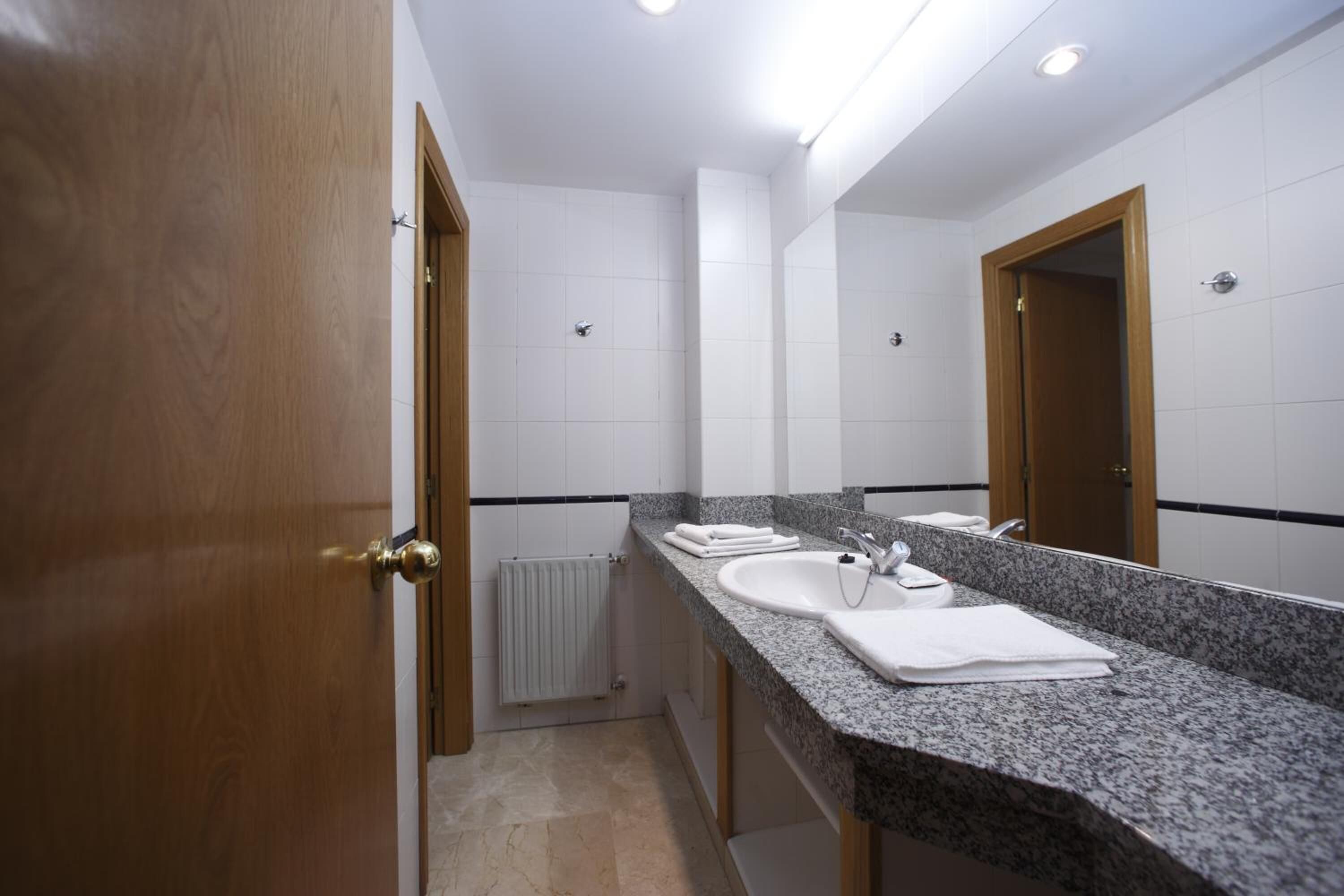 shower, towels, soap, toilet paper