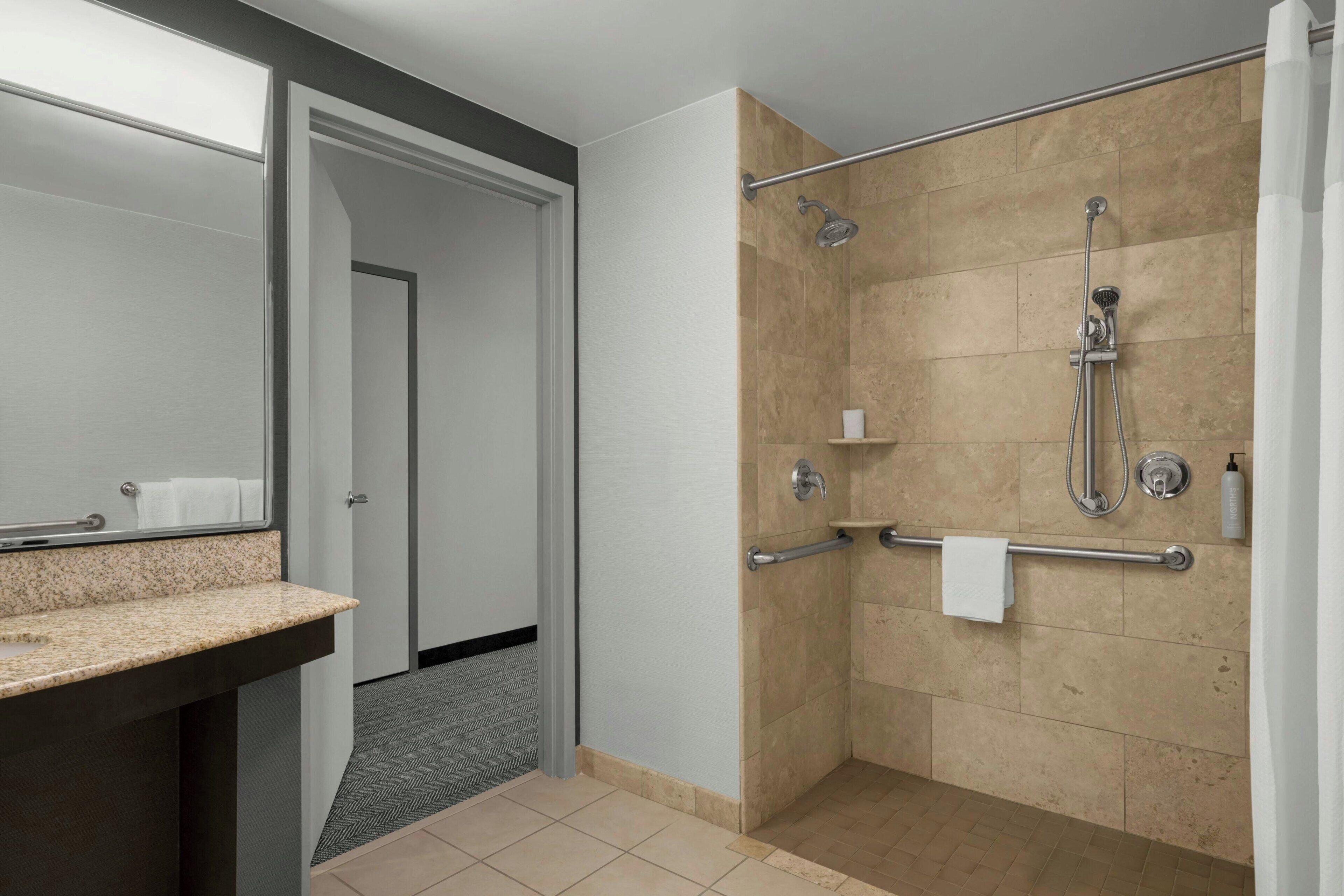 combined shower/bathtub, free toiletries, hair dryer, towels