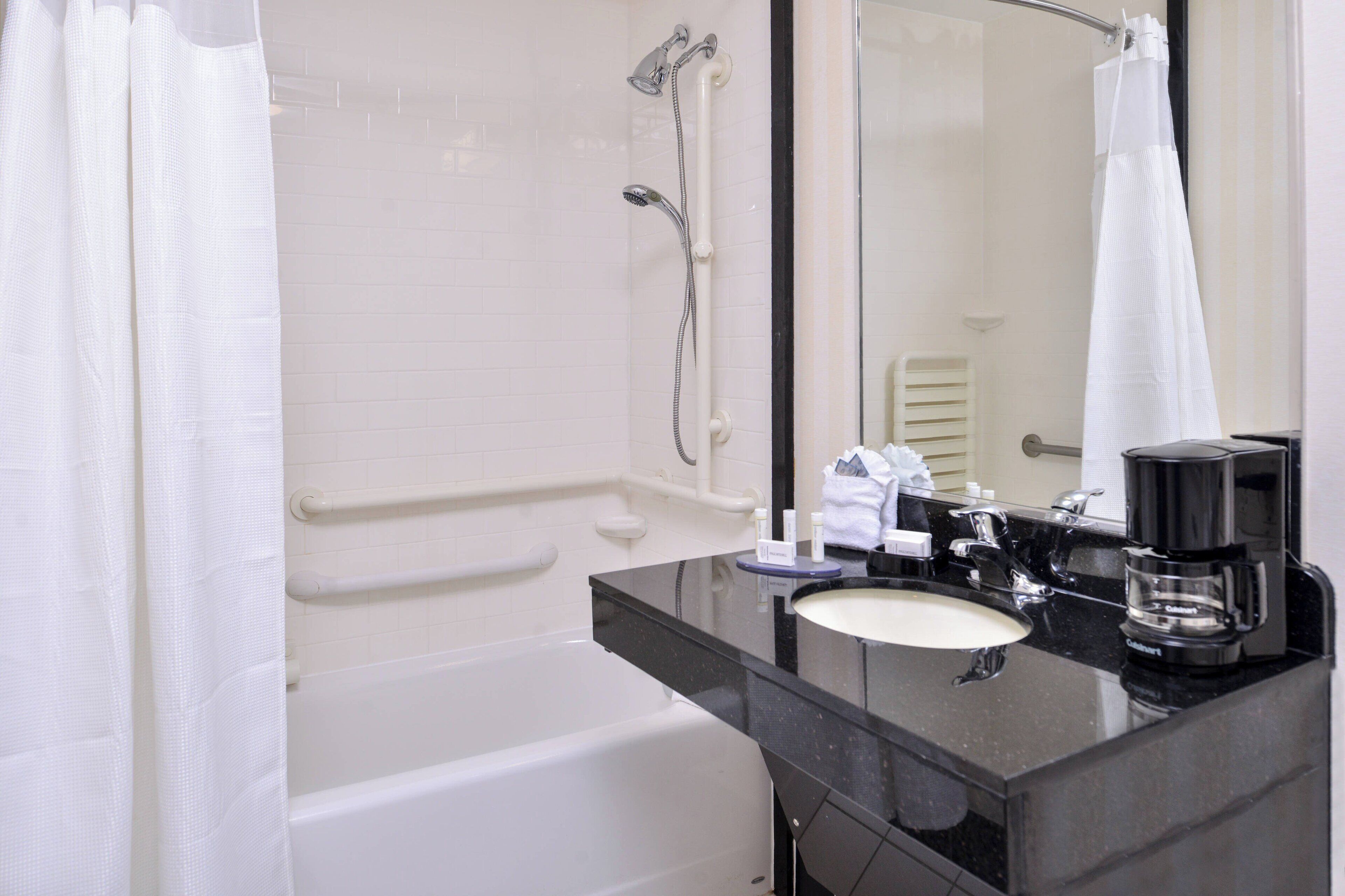 combined shower/bathtub, free toiletries, hair dryer, towels