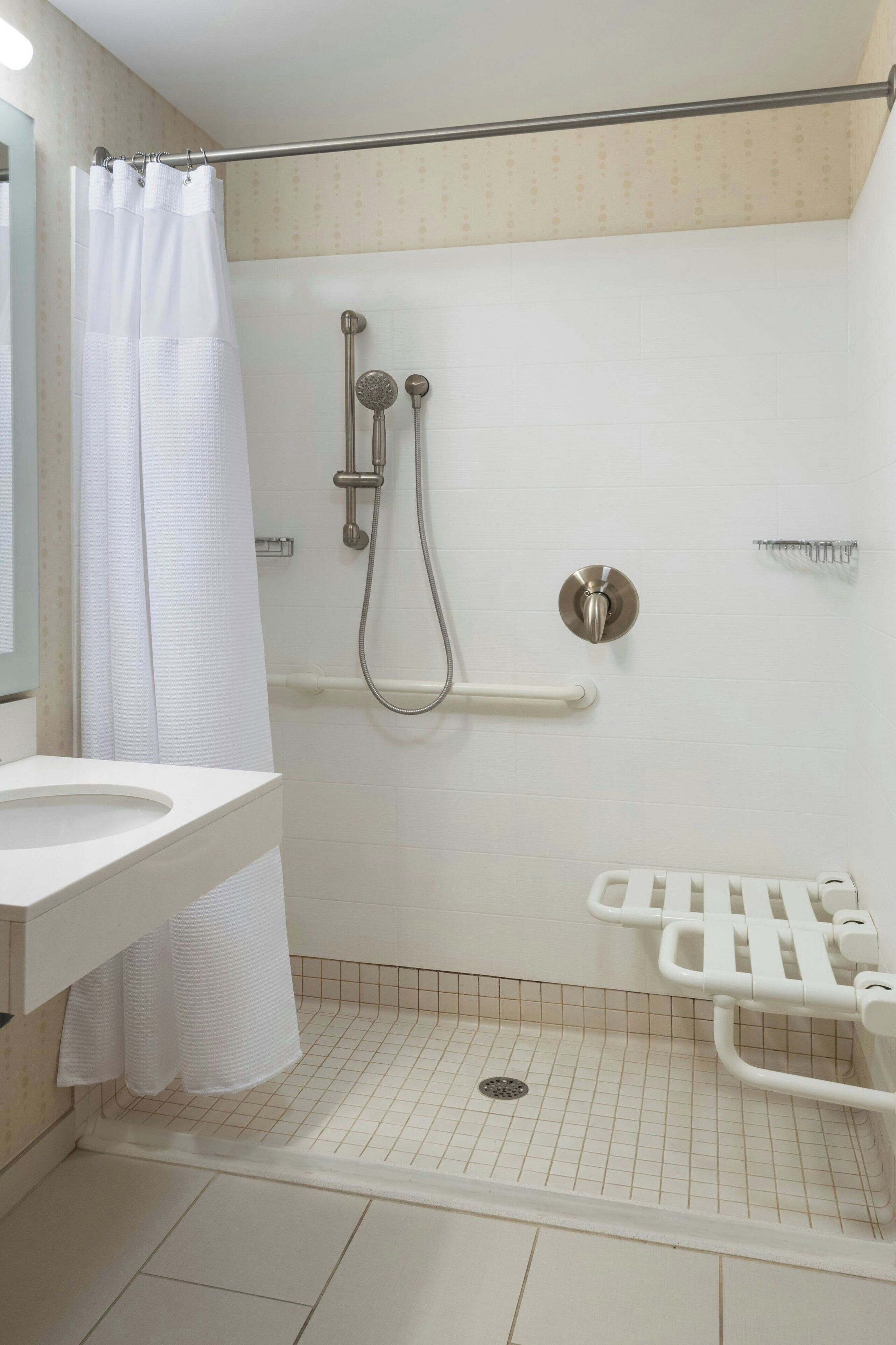 combined shower/bathtub, free toiletries, hair dryer, towels