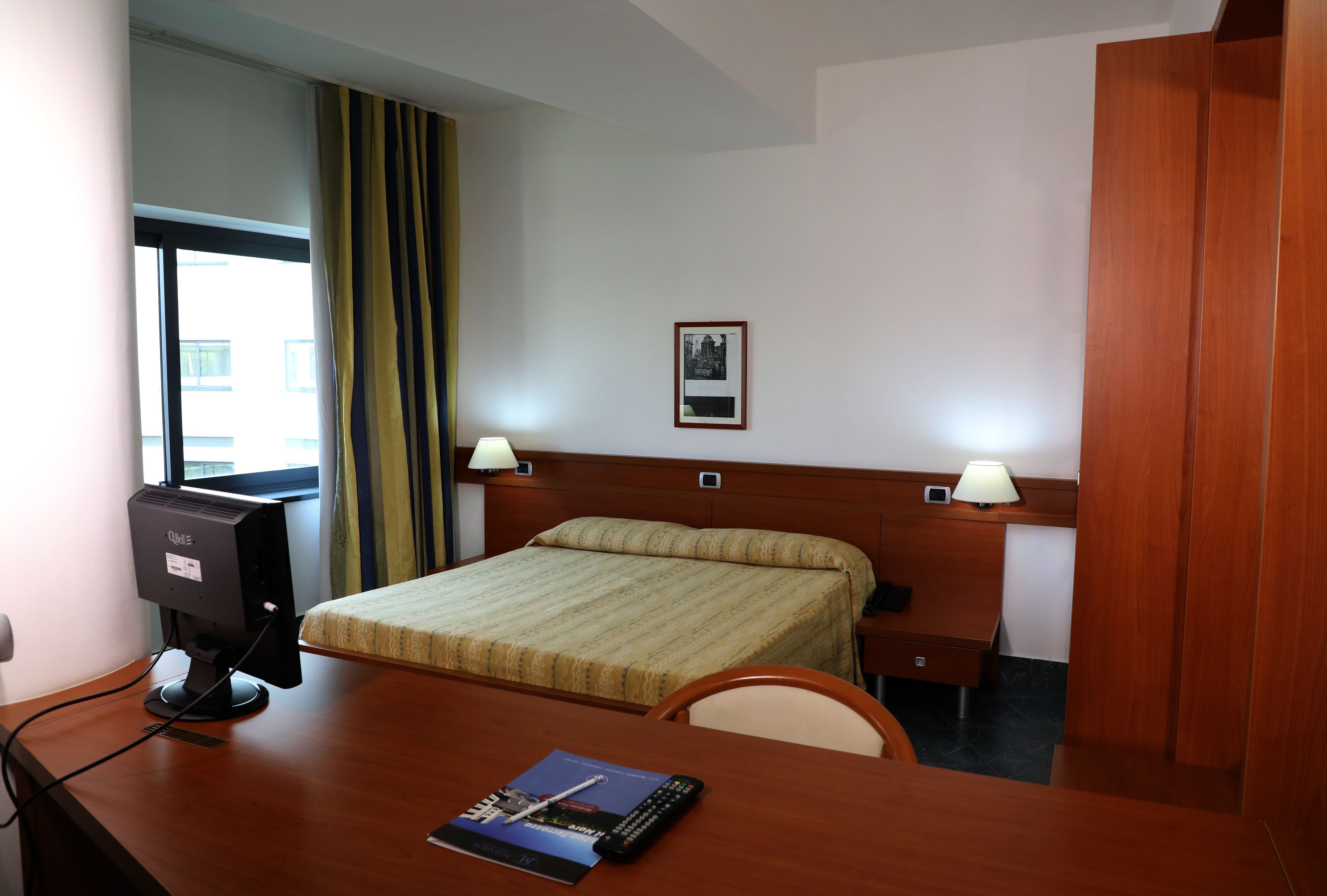 Italiaanse Frette-lakens, luxe beddengoed, donsdekens, een minibar