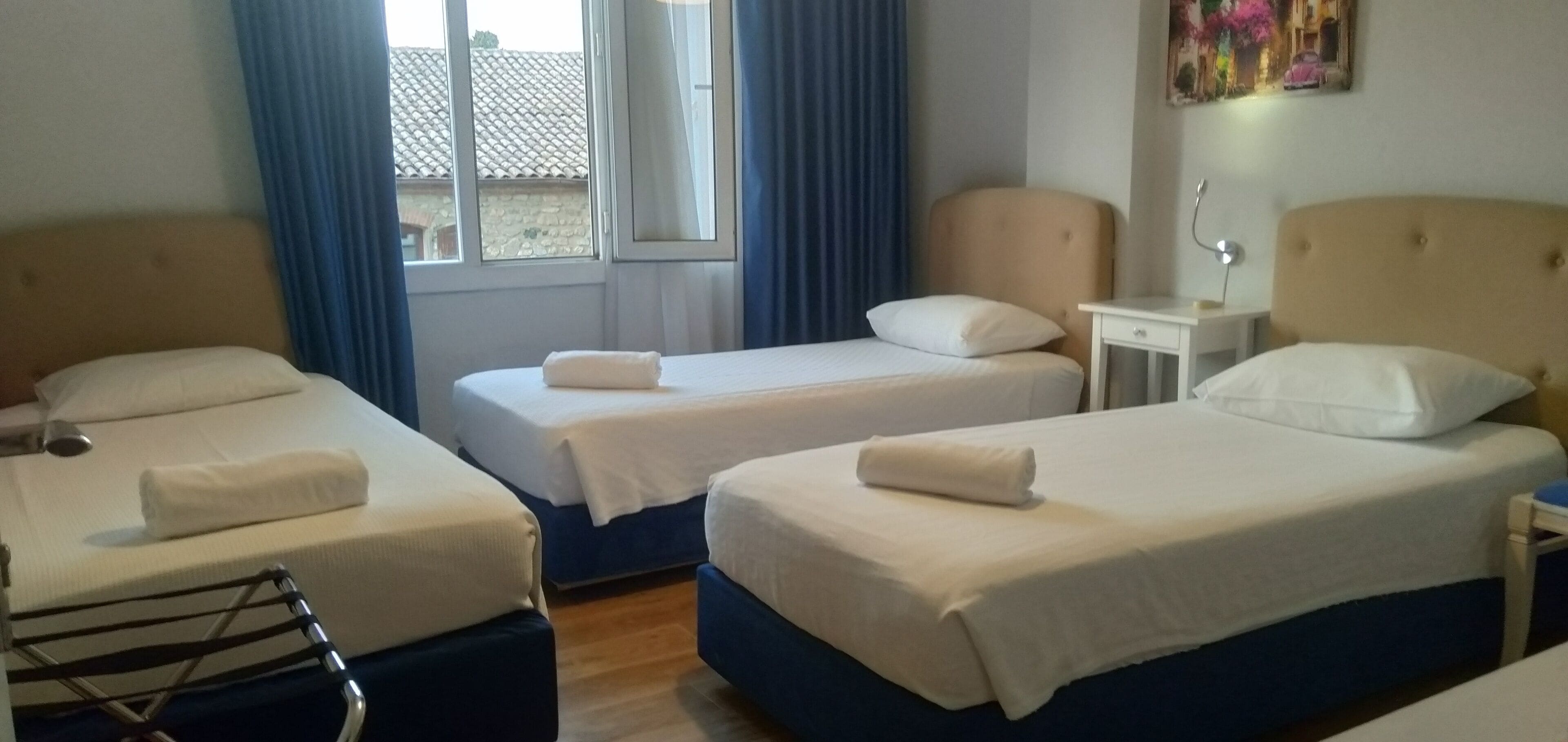 triple room | select comfort beds, iron/ironing board, free wifi, bed sheets