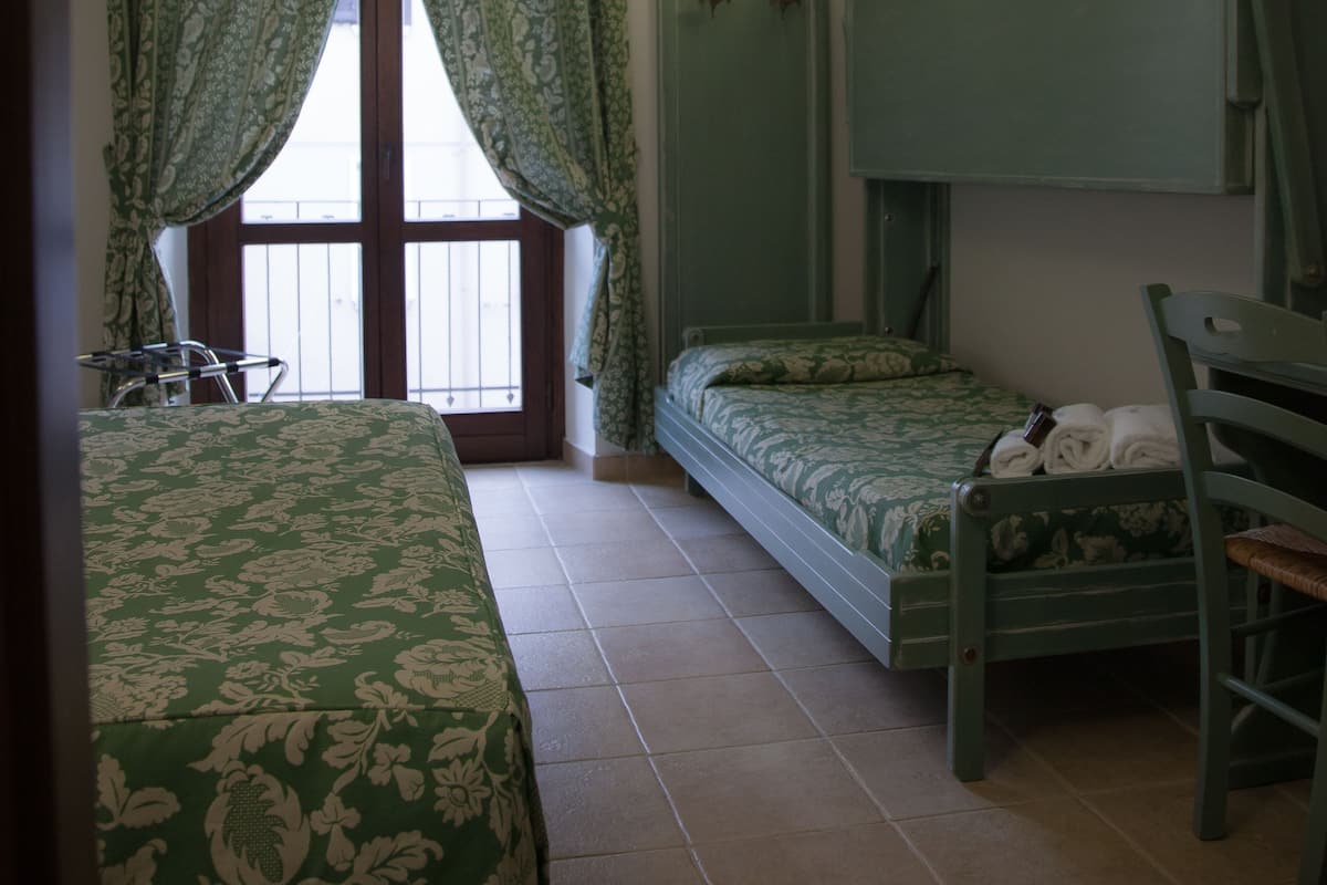 Driepersoonskamer | 10 slaapkamers, luxe beddengoed, Select Comfort-bedden, een minibar