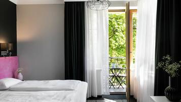 Superior Double or Twin Room | Minibar, in-room safe, individually decorated, desk