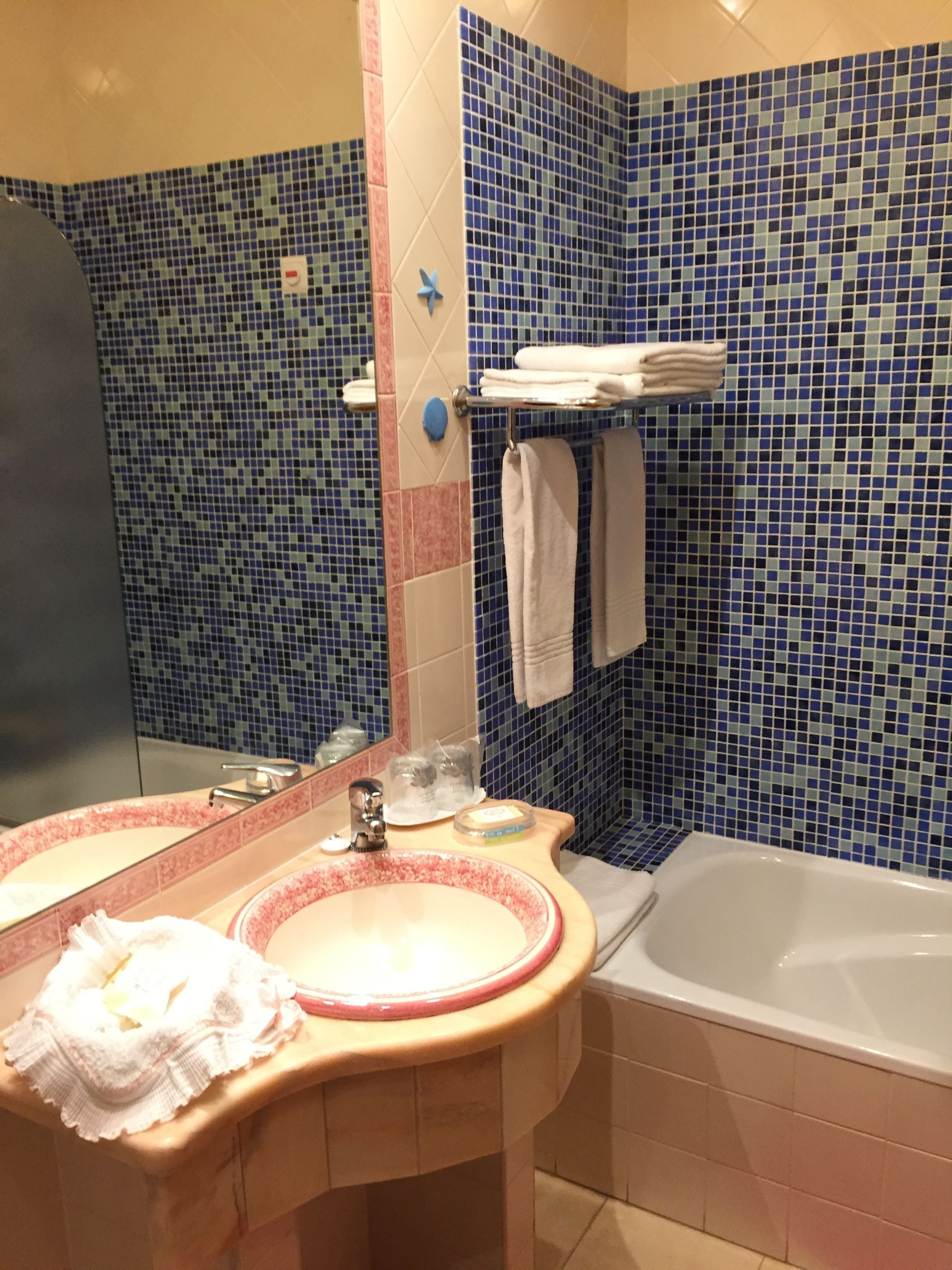 hair dryer, bathrobes, slippers, bidet