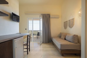 Duplex, Sea View | Living area | 24-inch plasma TV with satellite channels, TV, table tennis