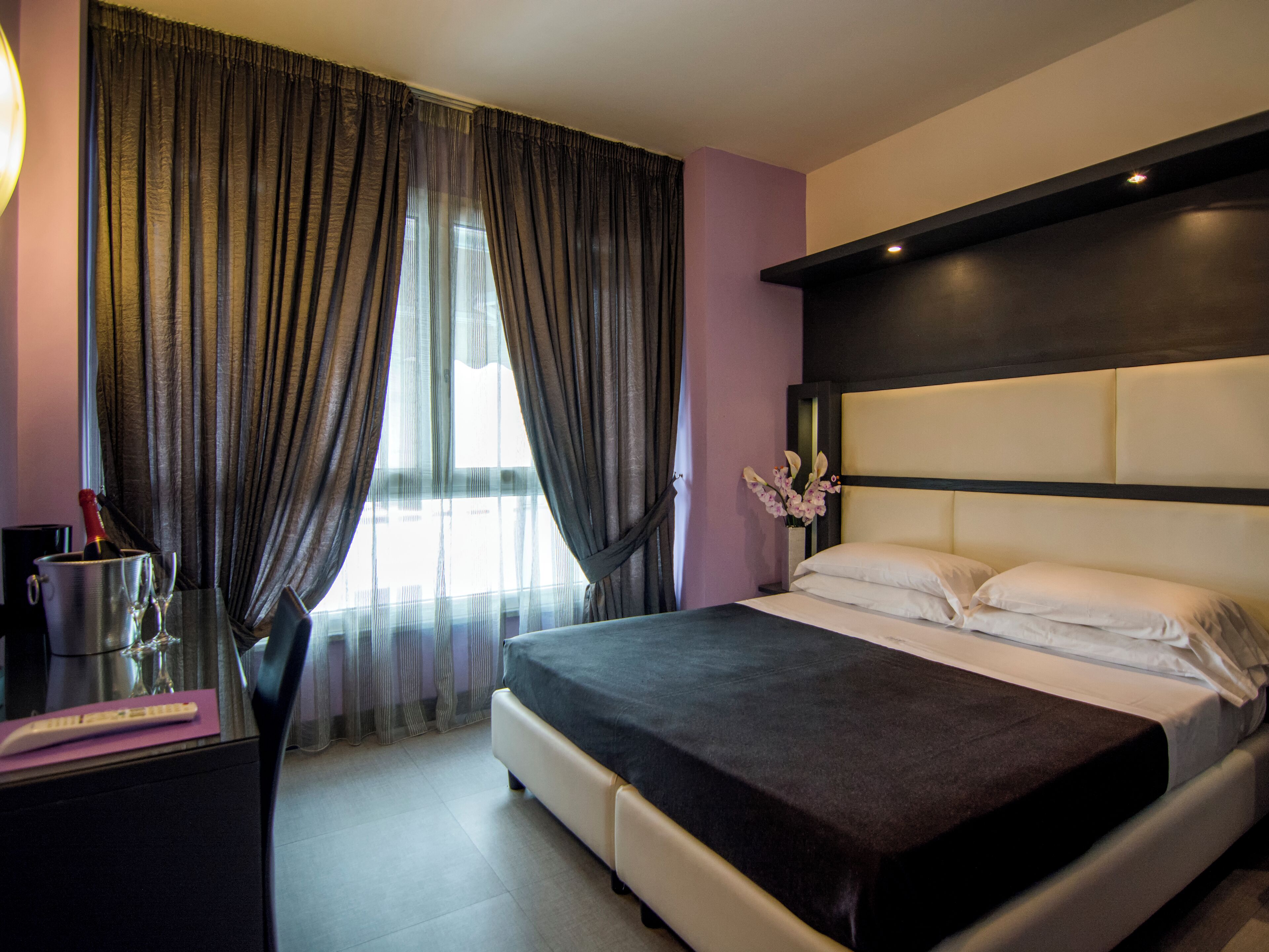 Premium bedding, down comforters, minibar, in-room safe