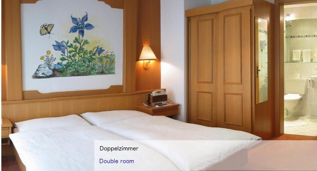 standard double room, balcony, mountain view | hypo-allergenic bedding, in-room safe, blackout curtains, soundproofing
