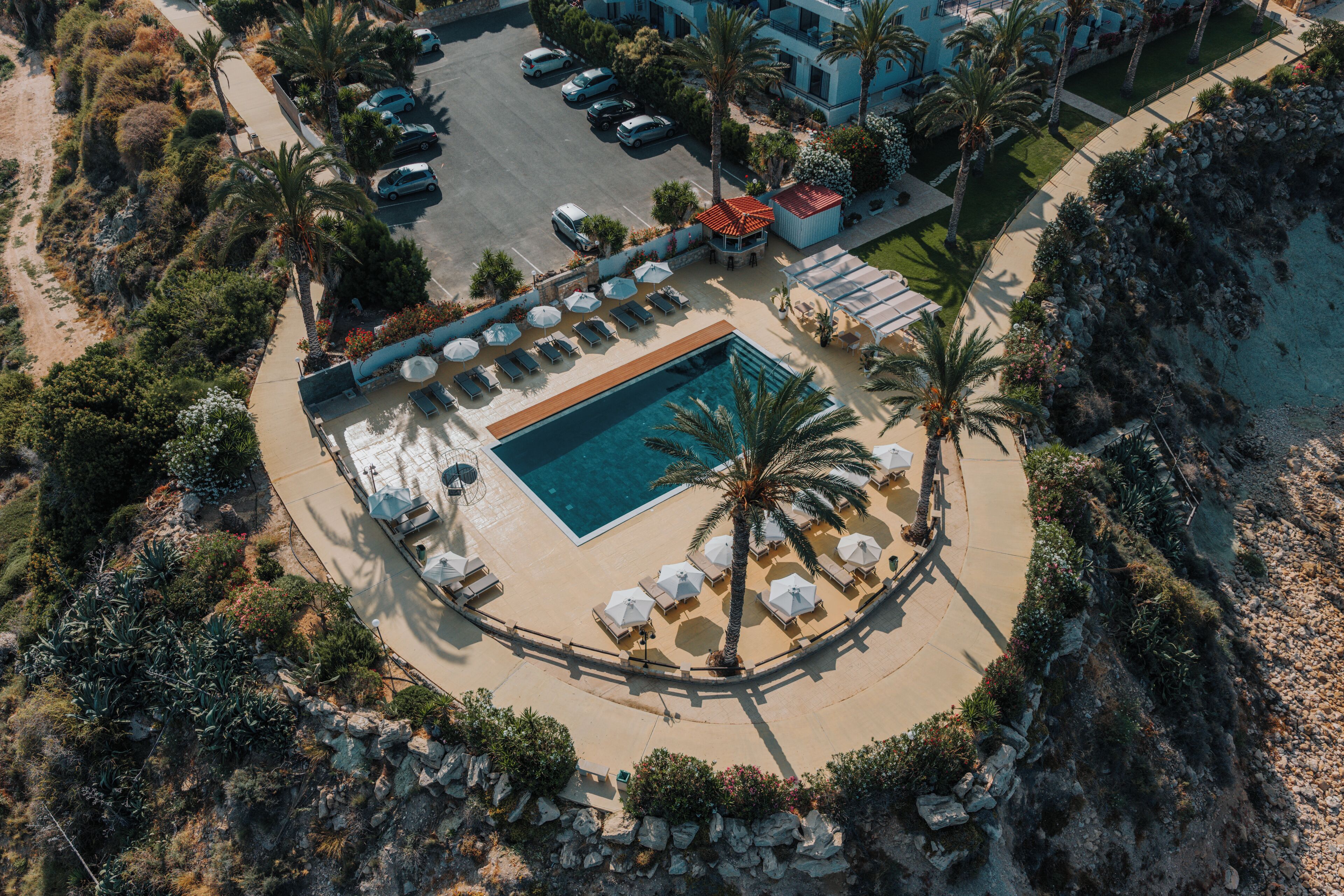 Seasonal outdoor pool, pool umbrellas, pool loungers
