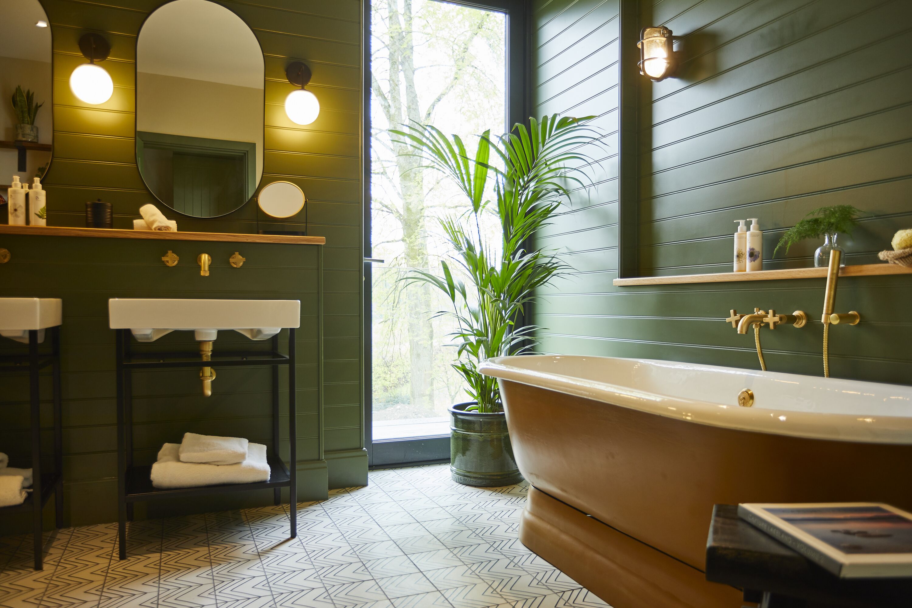 separate bathtub and shower, rainfall showerhead, designer toiletries