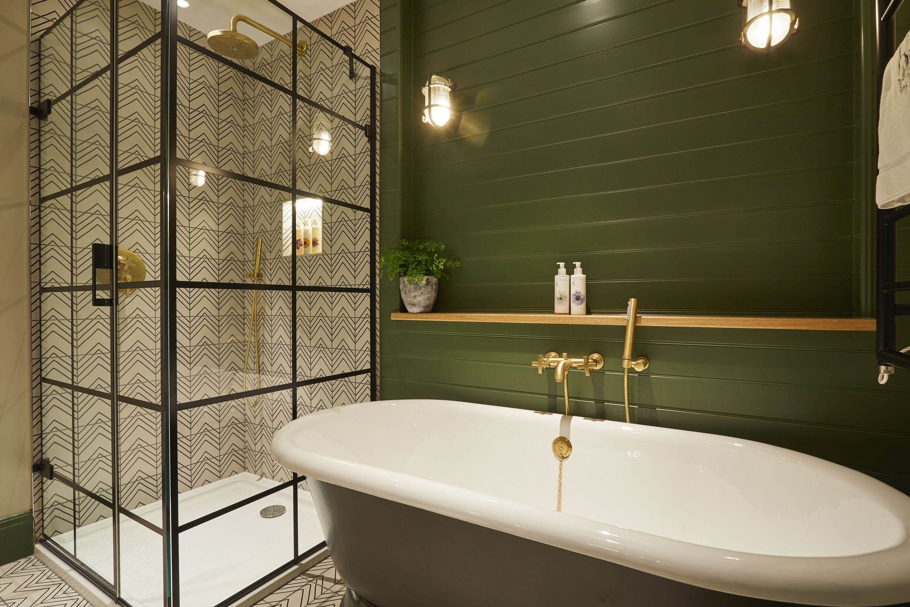 separate bathtub and shower, rainfall showerhead, designer toiletries