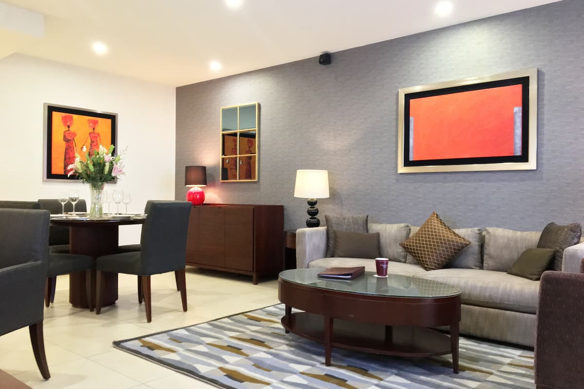 Executive Room | 1 bedroom, down comforters, in-room safe, iron/ironing board