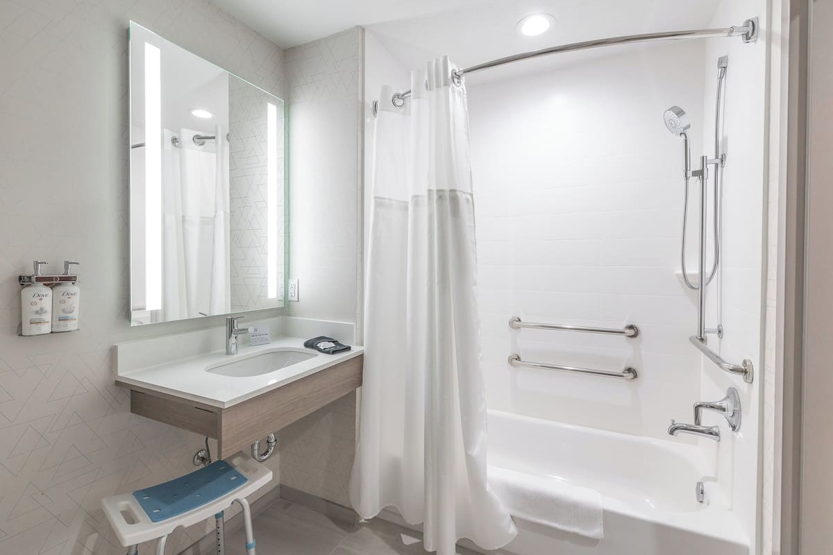 hair dryer, towels, soap, shampoo