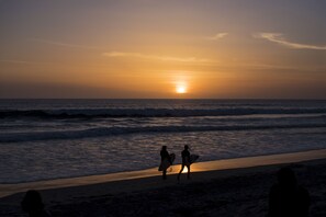 On the beach, sun loungers, beach umbrellas, beach towels
