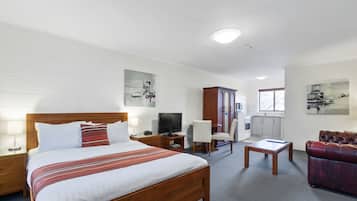 Ropa de cama de alta calidad y tabla de planchar con plancha