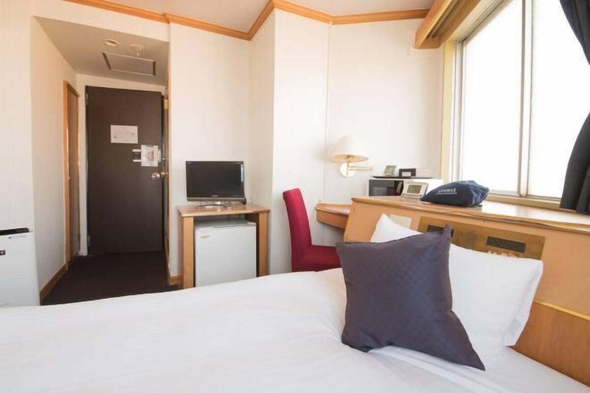 Desk, iron/ironing board (on request), WiFi (free)