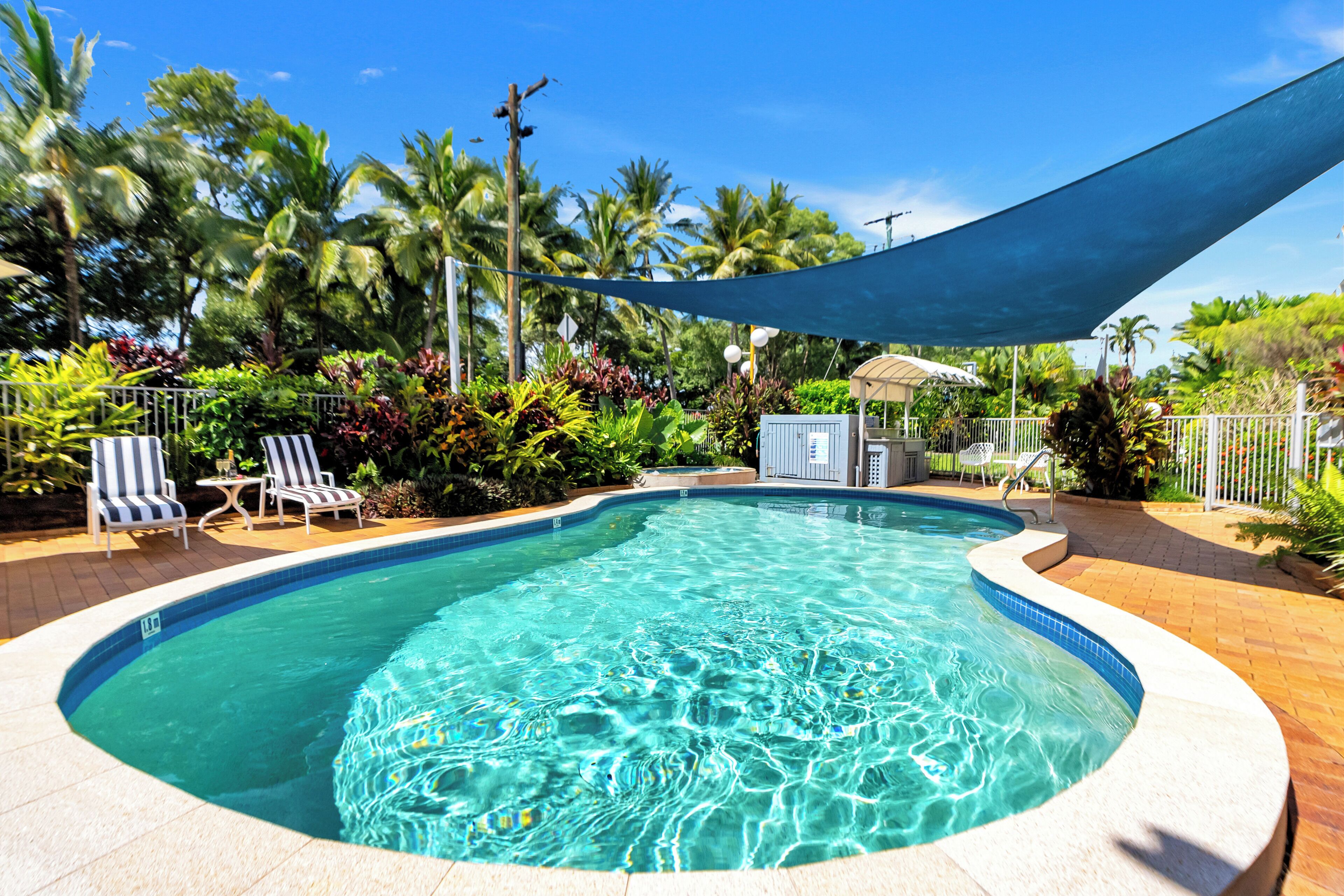 Outdoor pool, open 7:00 AM to 10:00 PM, pool loungers