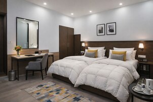 Quarto premium | Roupas de cama premium, edredons de pluma, camas com colchões pillow-top