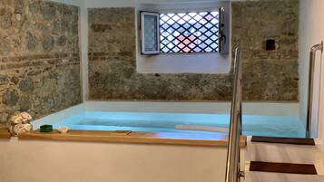 Indoor pool, sun loungers