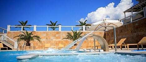 Indoor pool, 5 outdoor pools, pool umbrellas, pool loungers