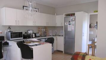Cottage (Self Catering) | Private kitchen | Full-size fridge, microwave, oven, stovetop