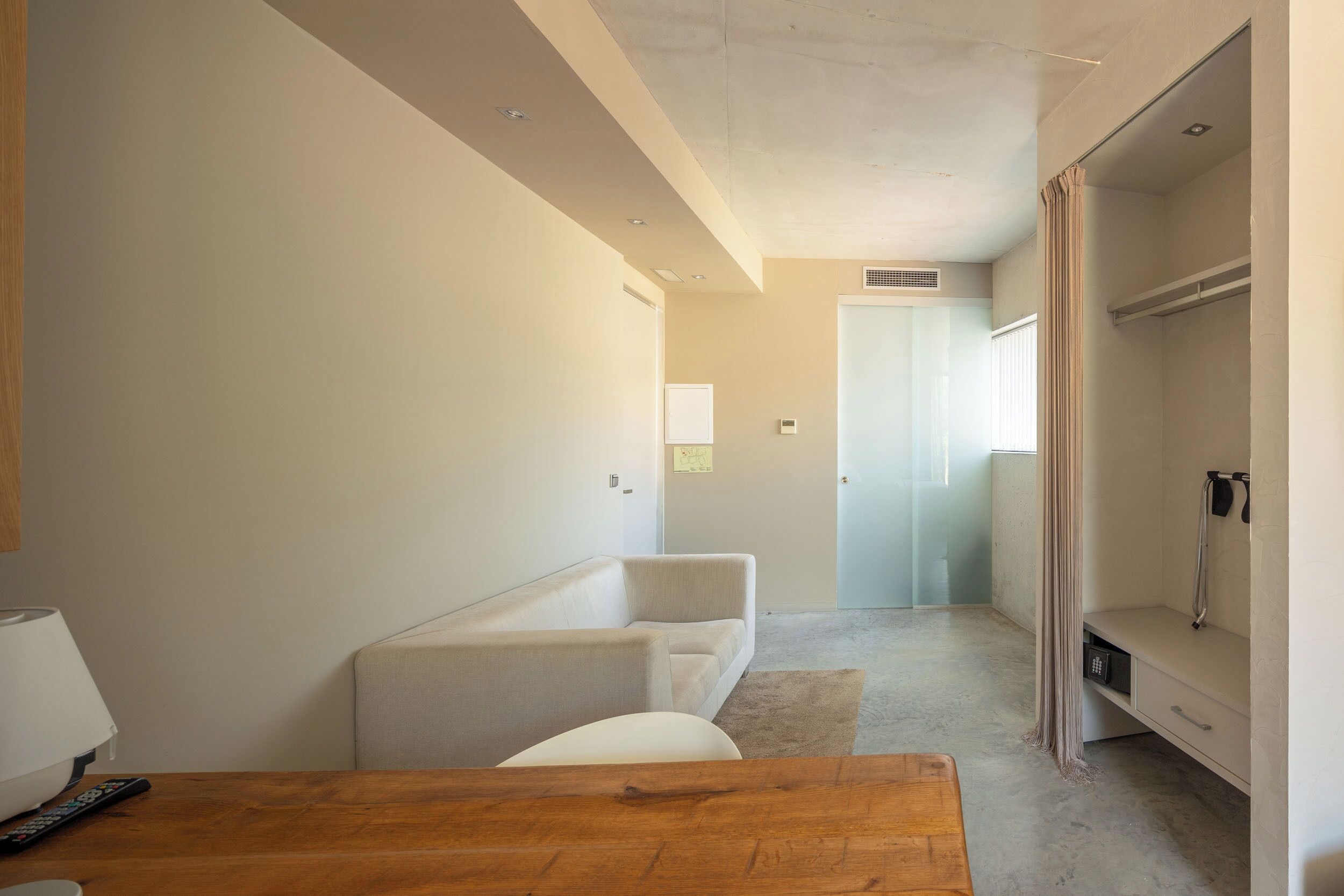 deluxe double room | living area | flat-screen tv, dvd player, heated floors