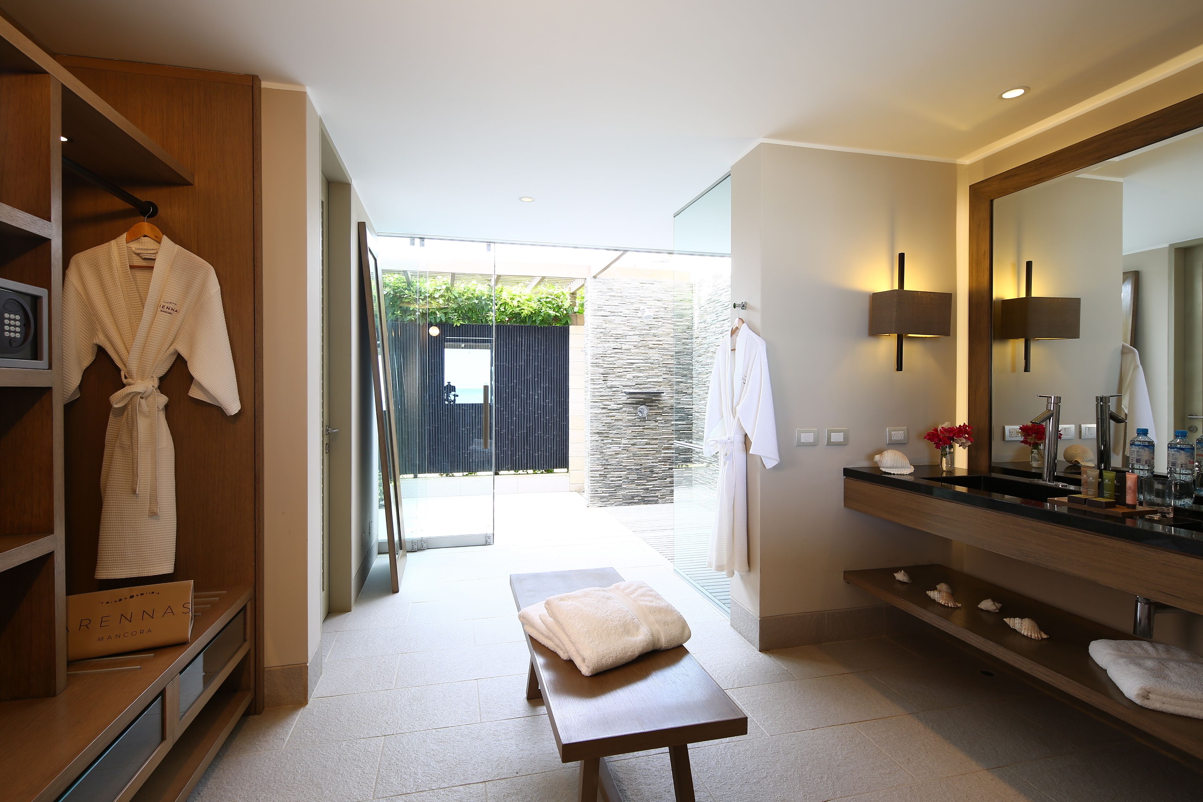 junior suite, private pool | bathroom | shower, rainfall showerhead, hair dryer, towels