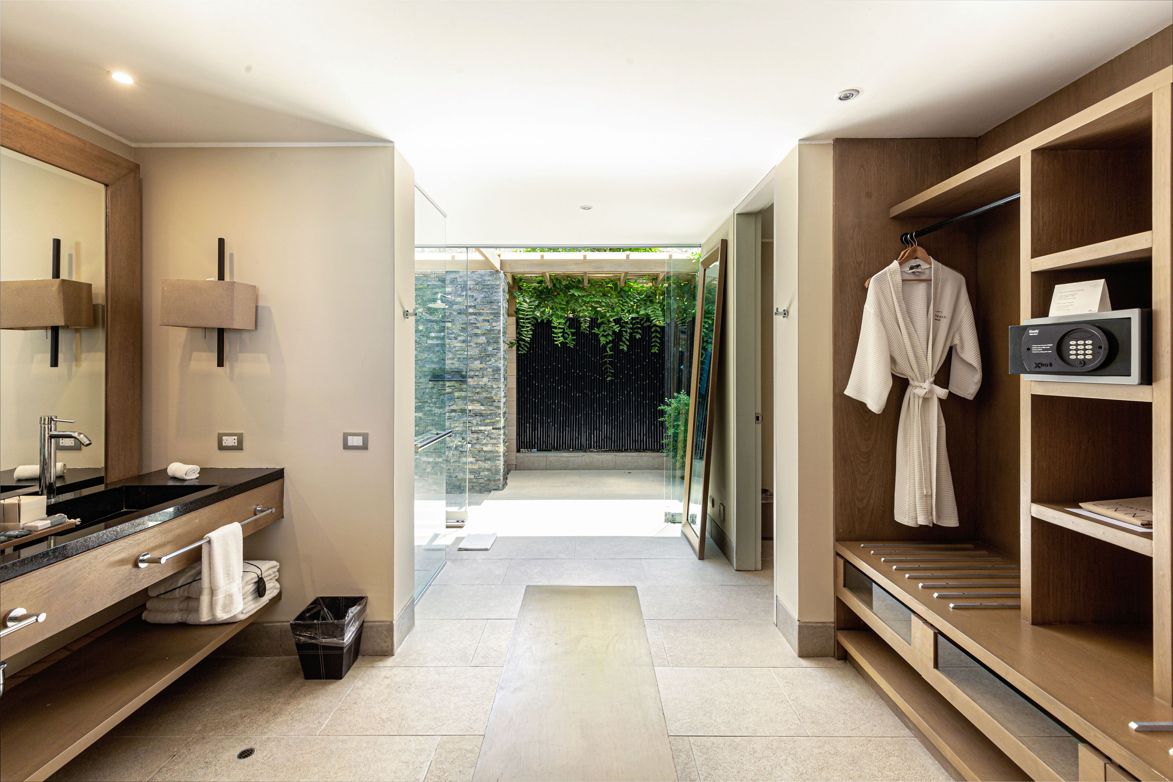 junior suite, private pool | bathroom | shower, rainfall showerhead, hair dryer, towels