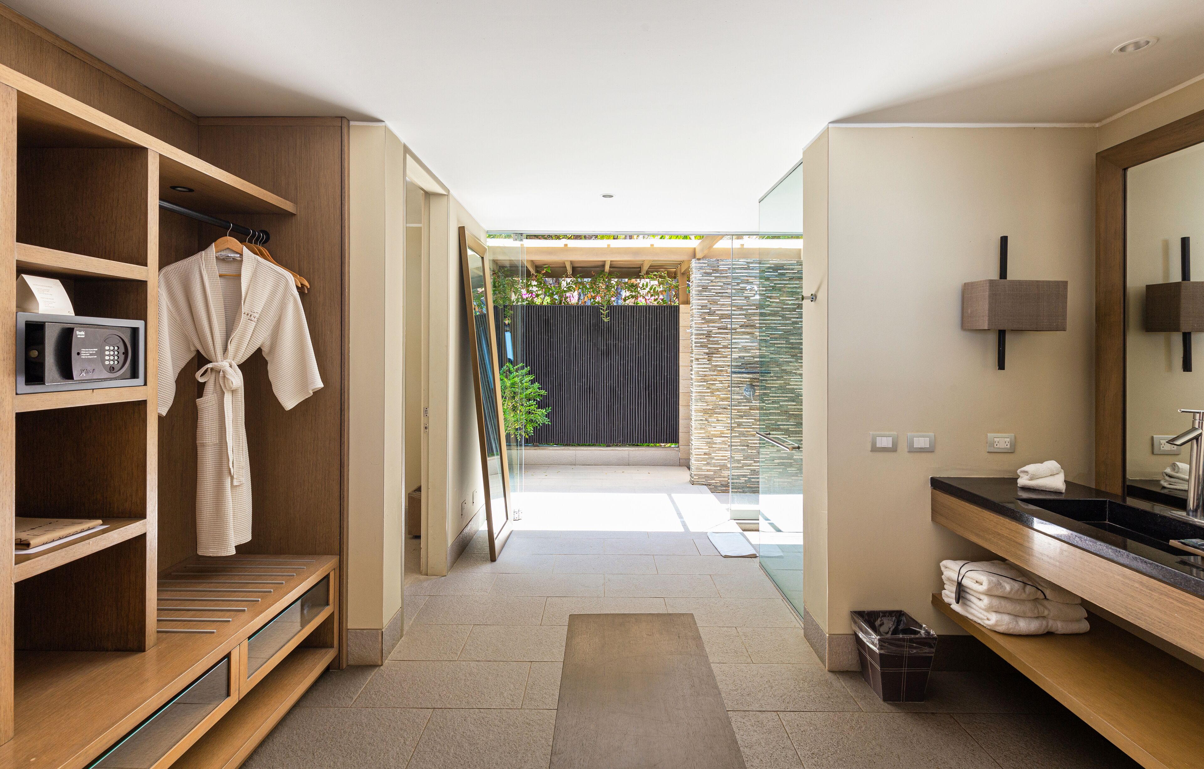 junior suite, private pool | bathroom | shower, rainfall showerhead, hair dryer, towels