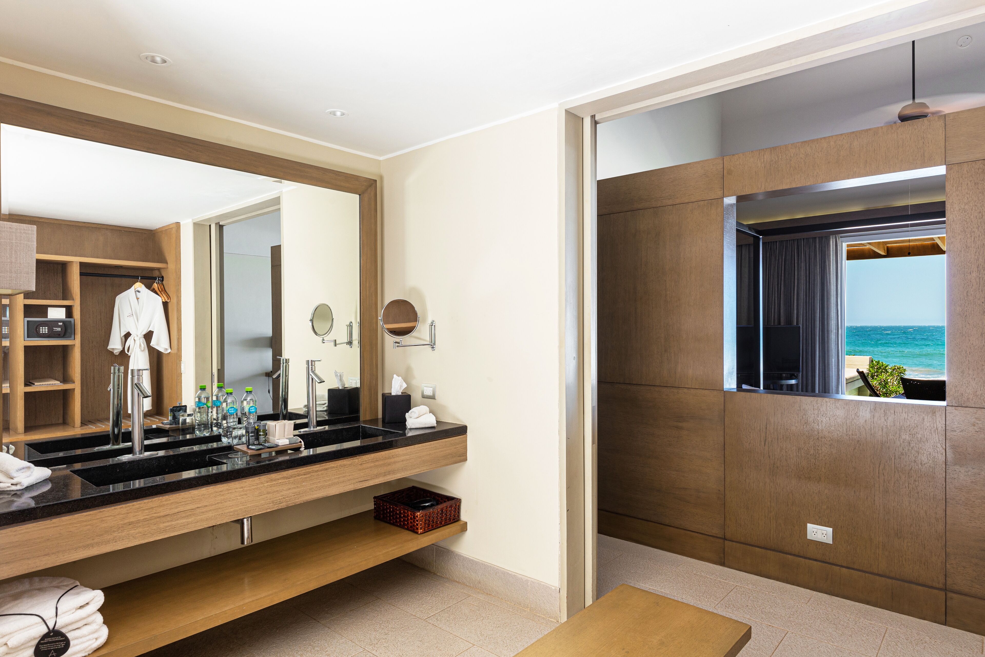junior suite, private pool | bathroom | shower, rainfall showerhead, hair dryer, towels