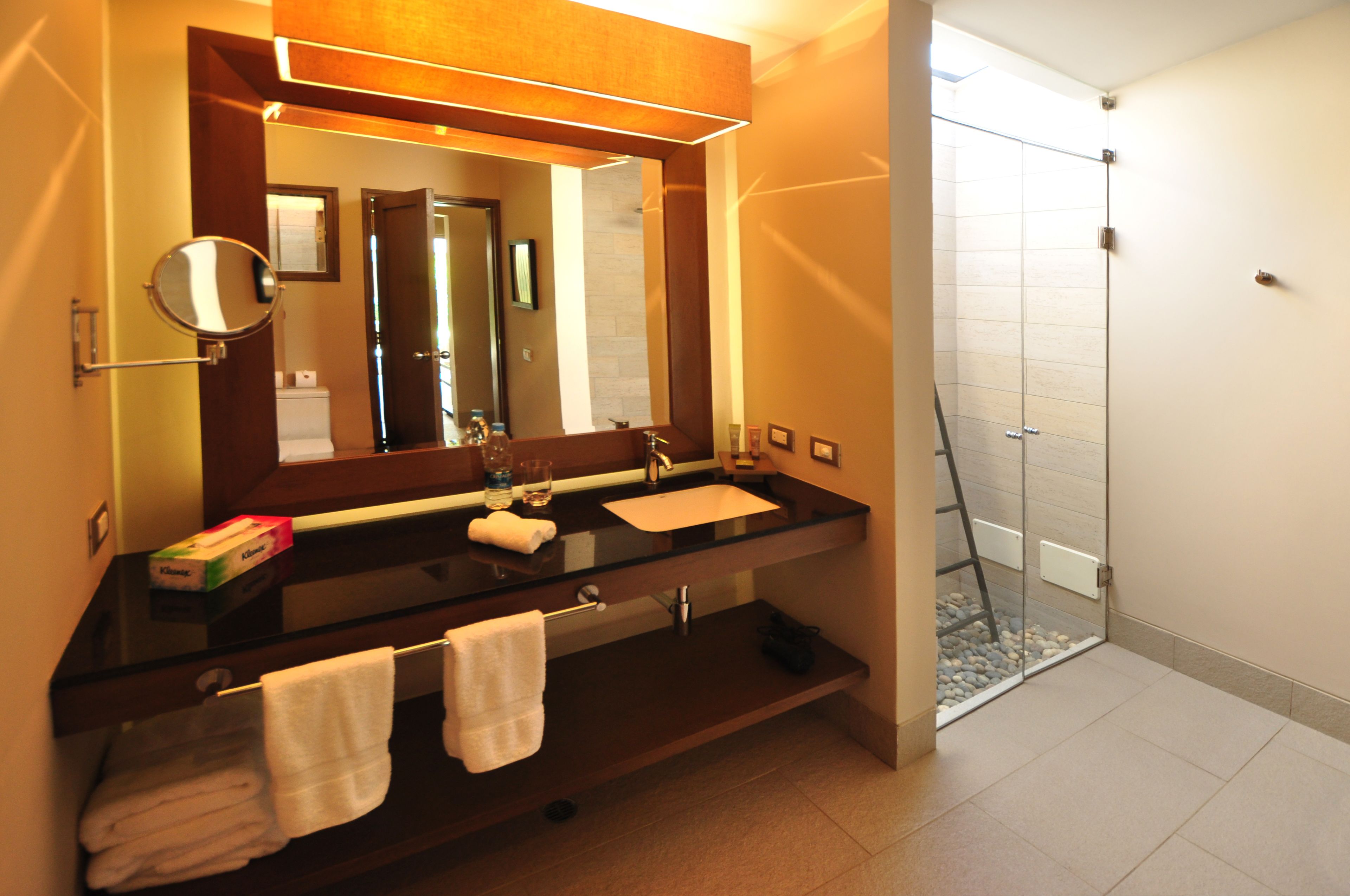 shower, rainfall showerhead, hair dryer, towels